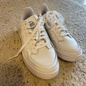 Adidas white three strip sneakers